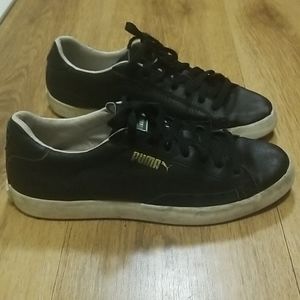 Black Puma sneakers